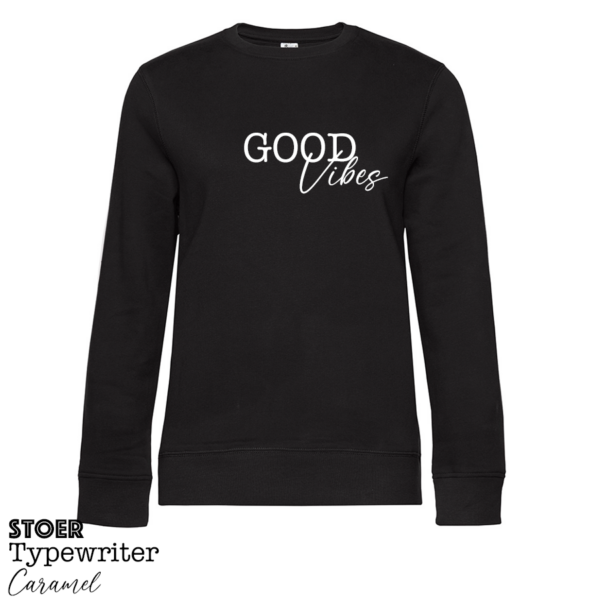 Zwarte sweater met quote Good Vibes